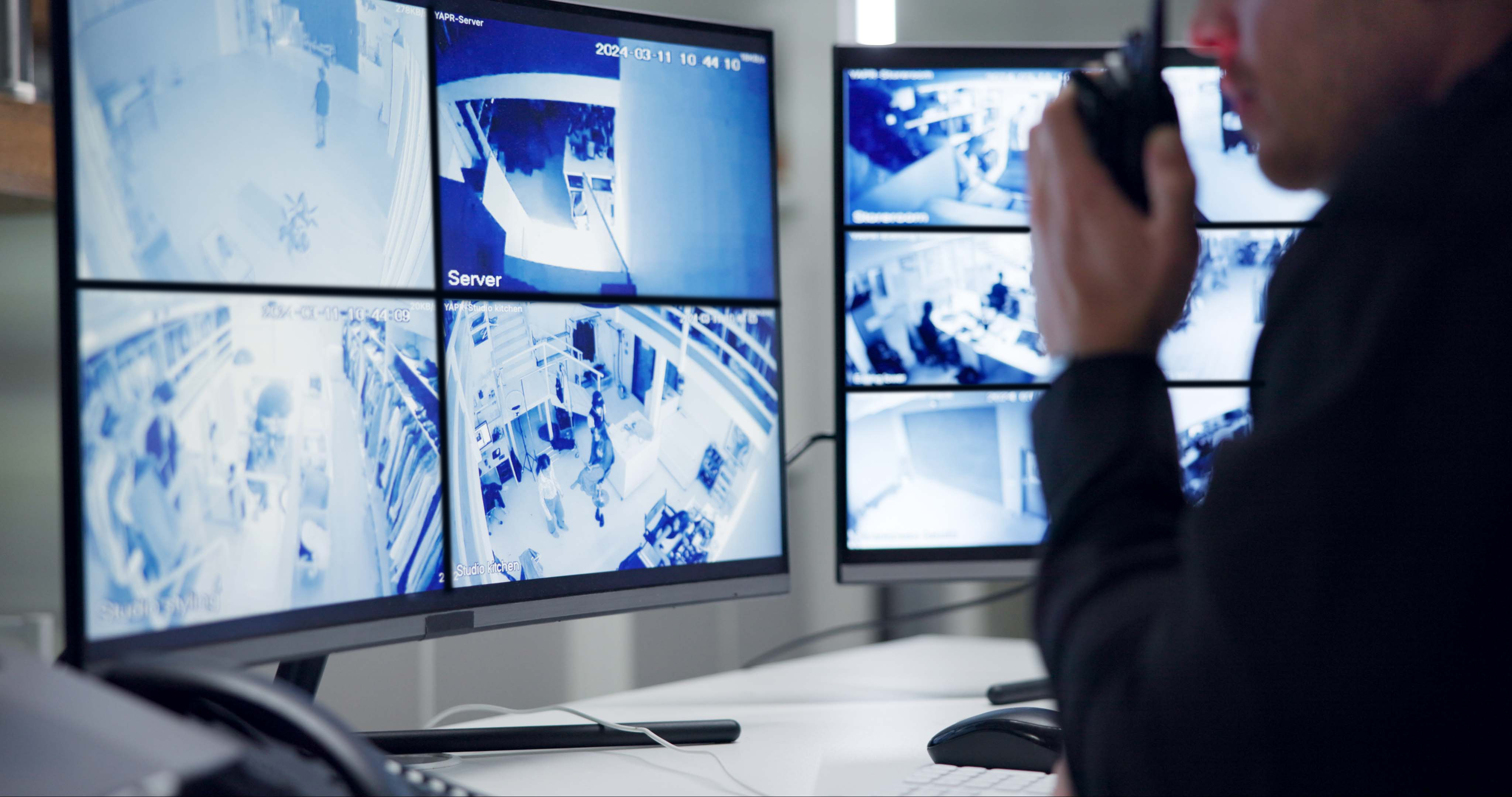 Security guard watching CCTV footage