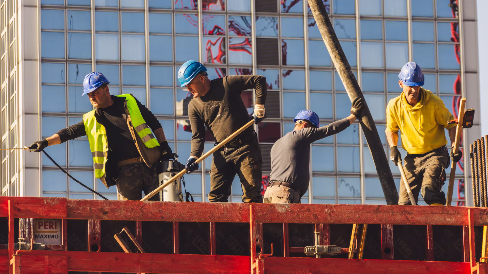 Construction crew on a job site all working together towards finishing the project