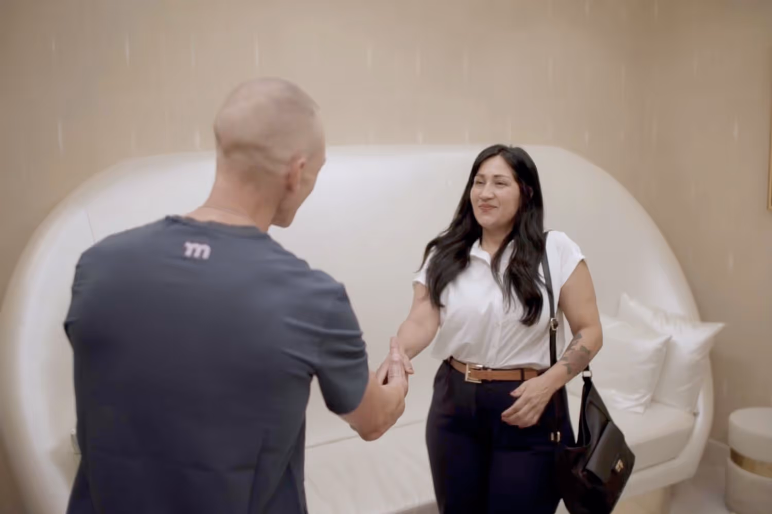 Los Angeles woman discussing fertility conditions, detailed history, and tailored plans with doctor