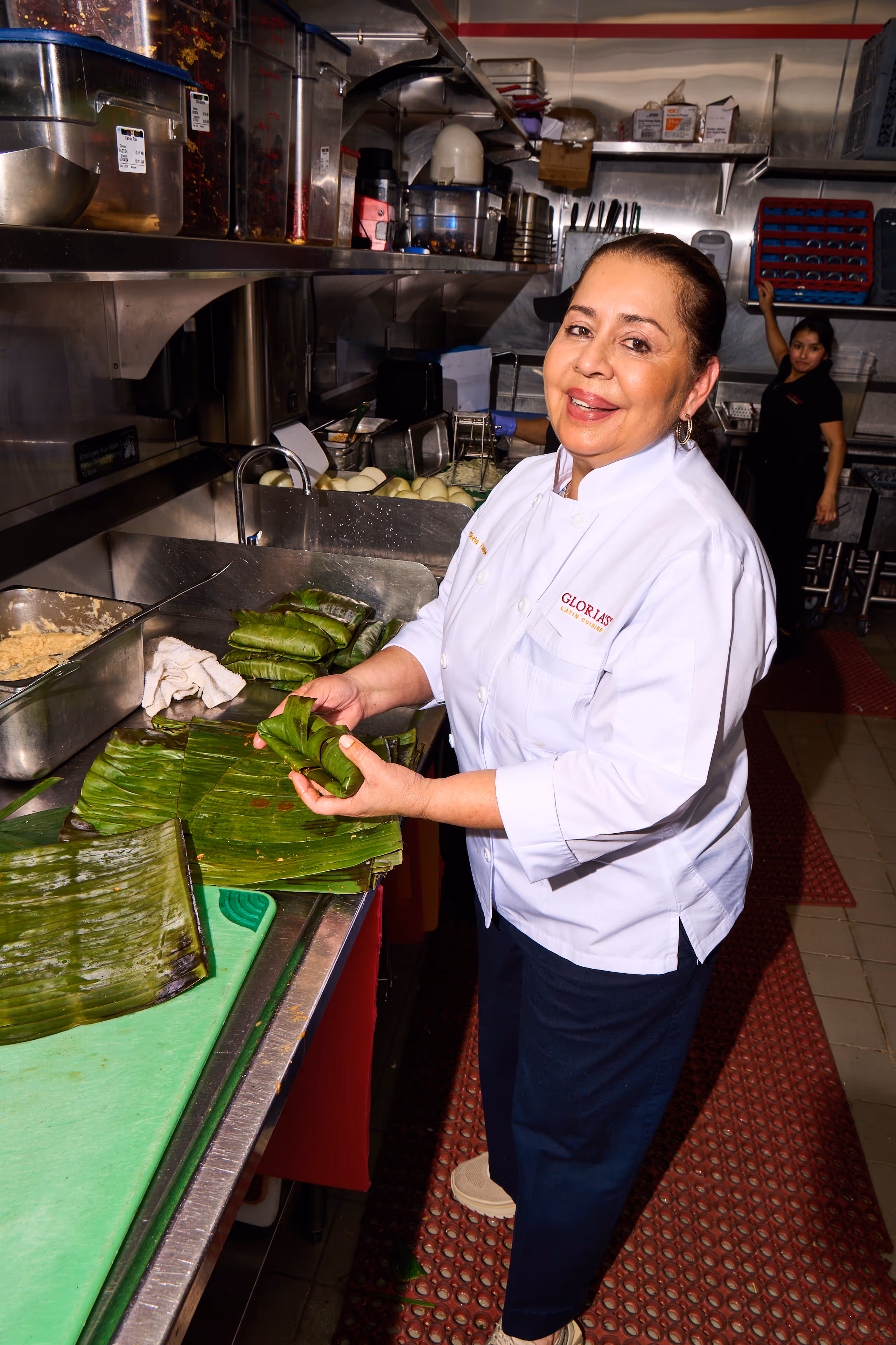 Gloria preparing fresh food in the kitchen