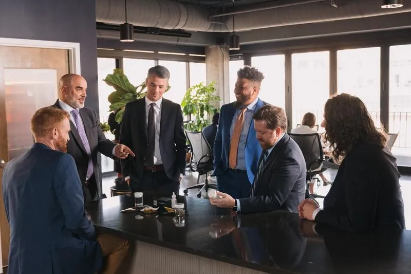 Businessmen in suits engaged in discussion