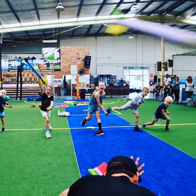 Kids playing indoor sport