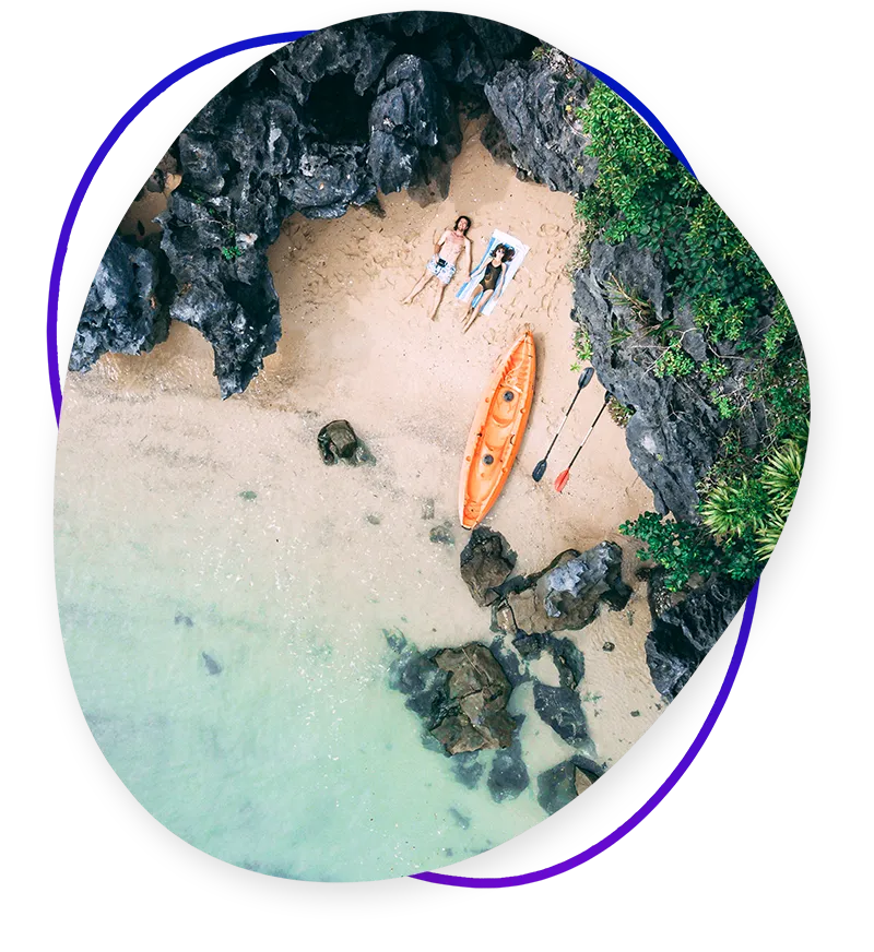 Two tourists relaxing on the beach