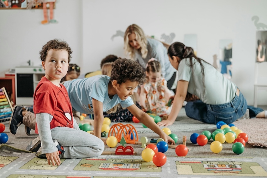 Children engaging in Montessori sensory play activities at OC Toddler School daycare in Ladera Ranch