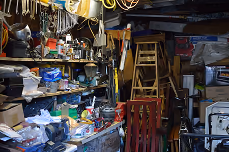 Garage messy with tools and other stuff