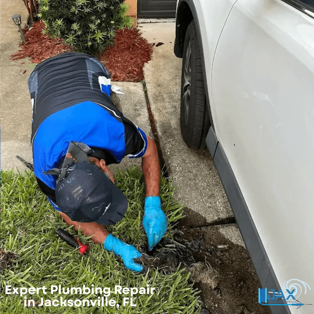 plumber doing repairs outside