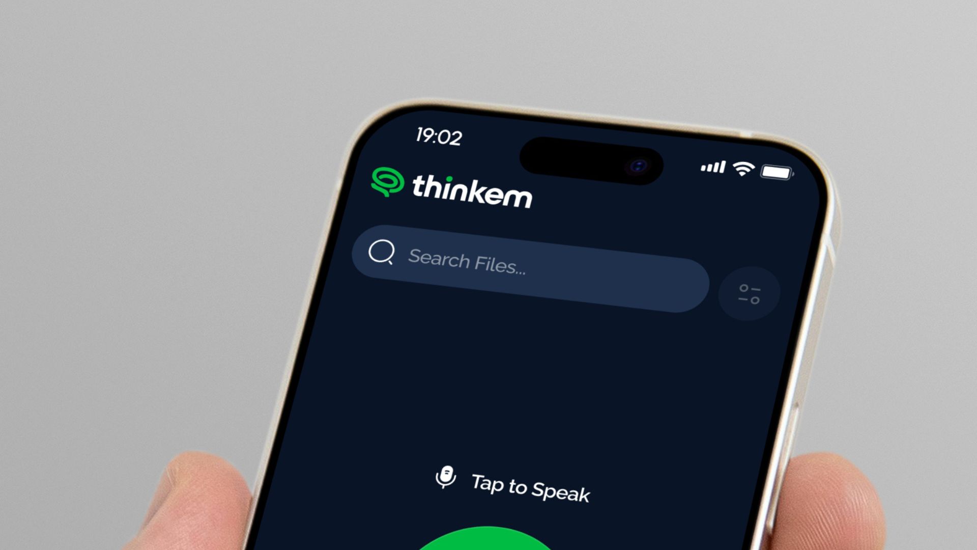 Close-up of a smartphone screen showing the Thinkem app with a search bar and a microphone icon labeled Tap to Speak.