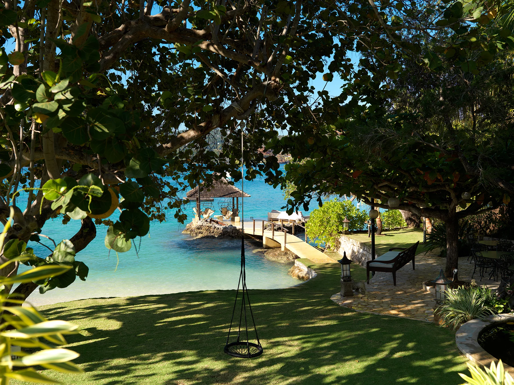 The lush garden overlooking the water