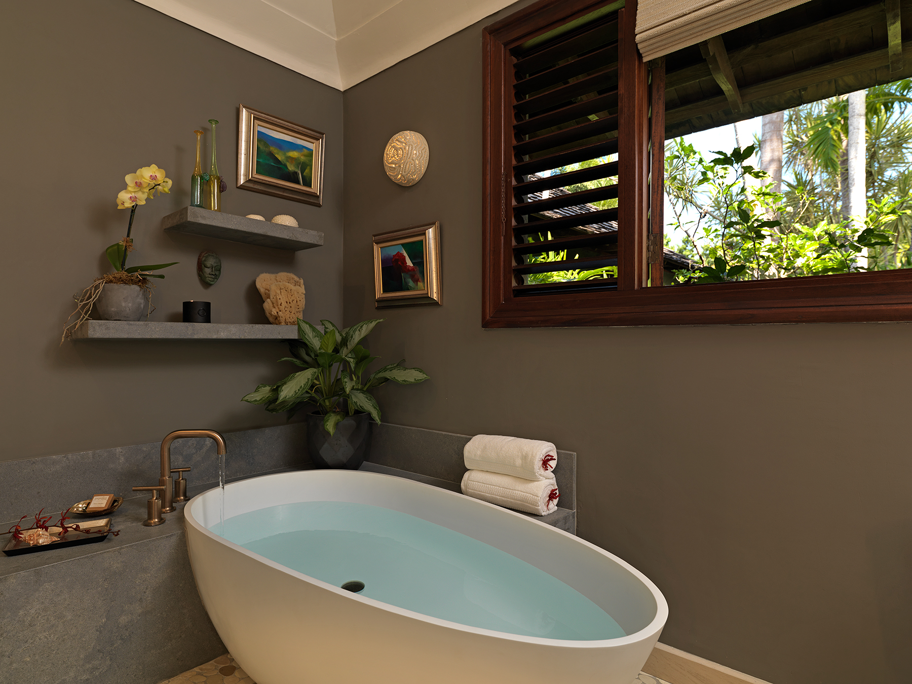 An ensuite bathroom with freestanding bathtub