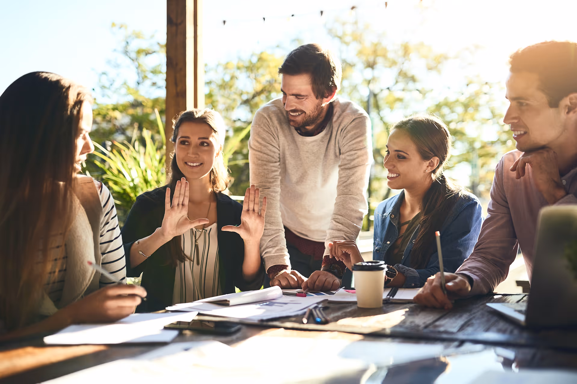People holding a business concept meeting — representing integrated control accounts