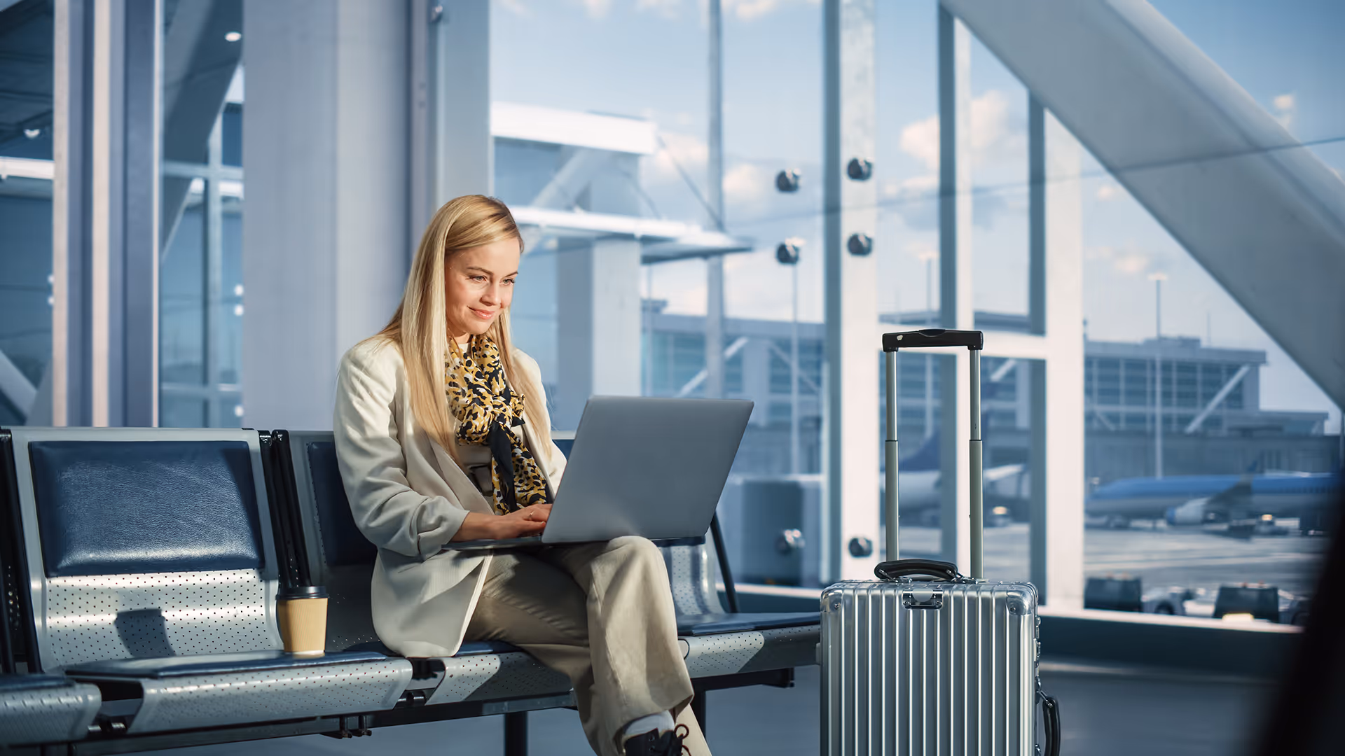 Woman working in an airport departure lounge