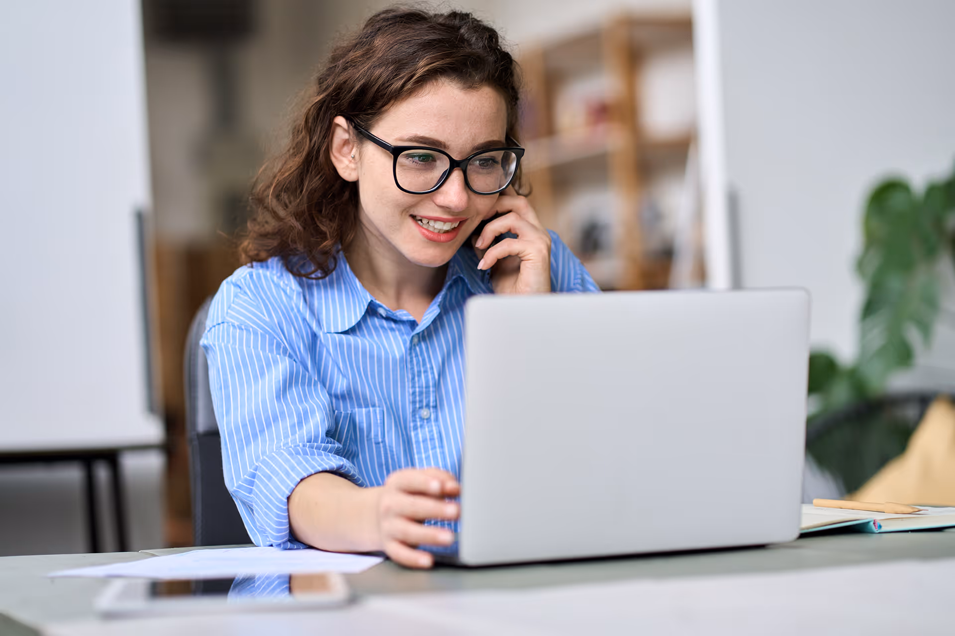 Woman providing tech support over the phone