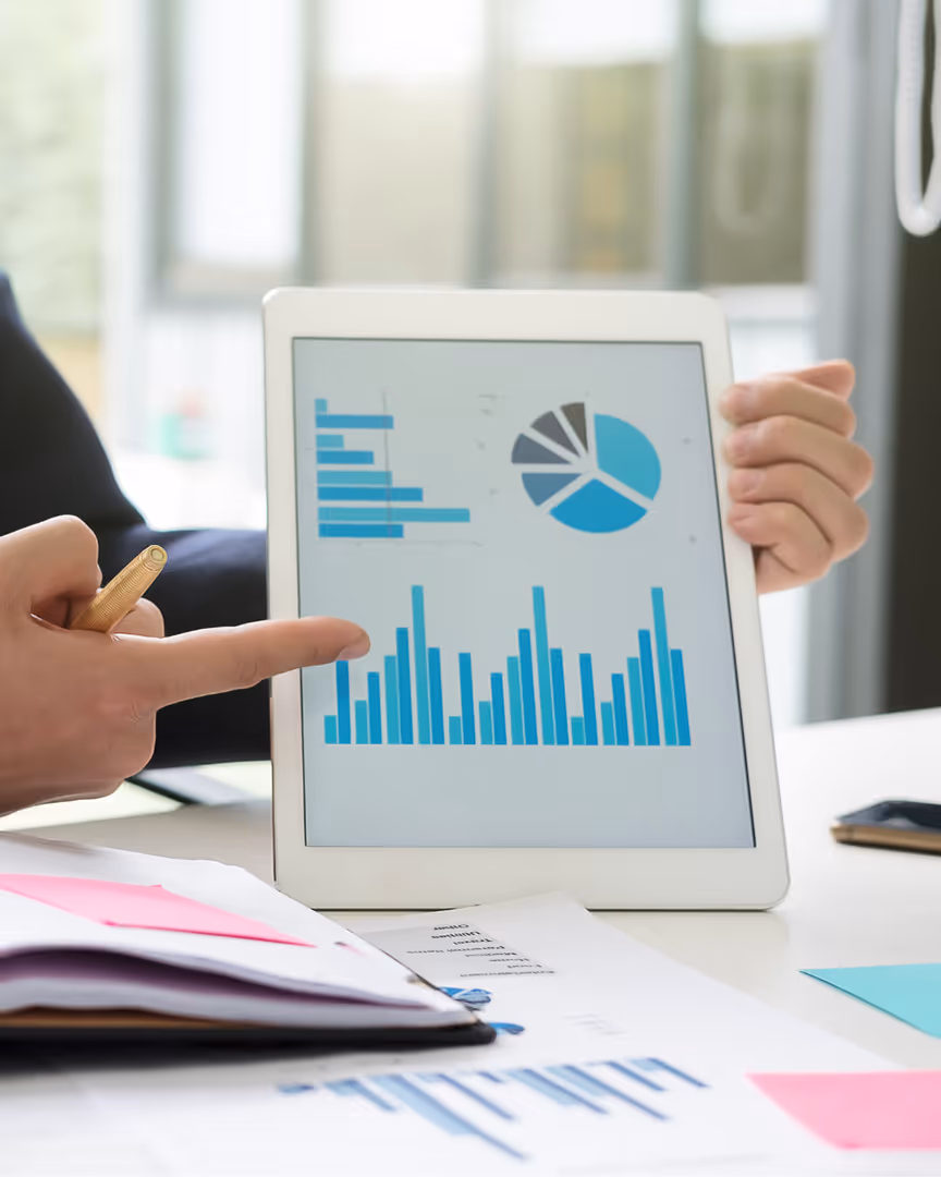 Graphs and charts on a tablet device representing account growth