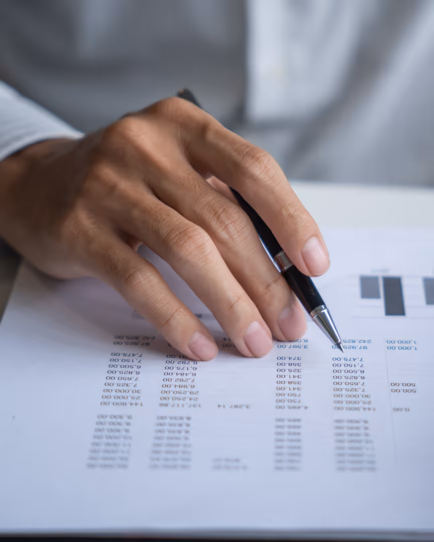 Person checking a financial report