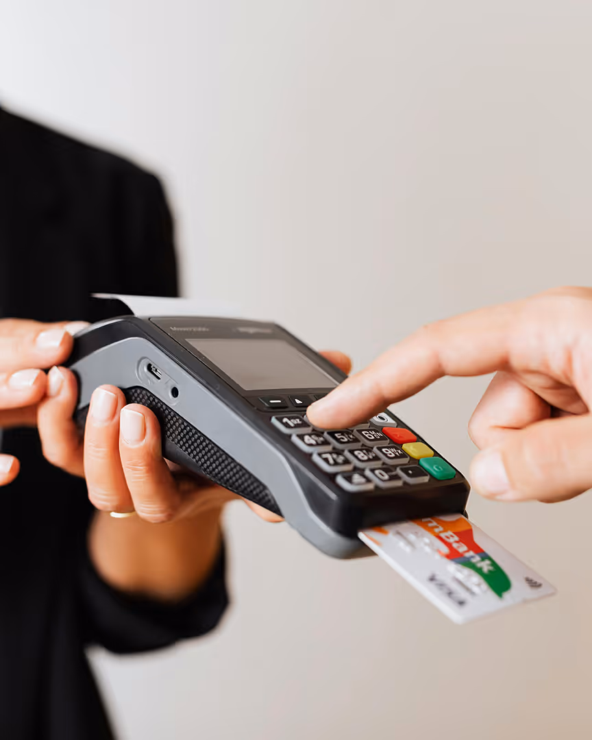 Person making a payment on a card machine