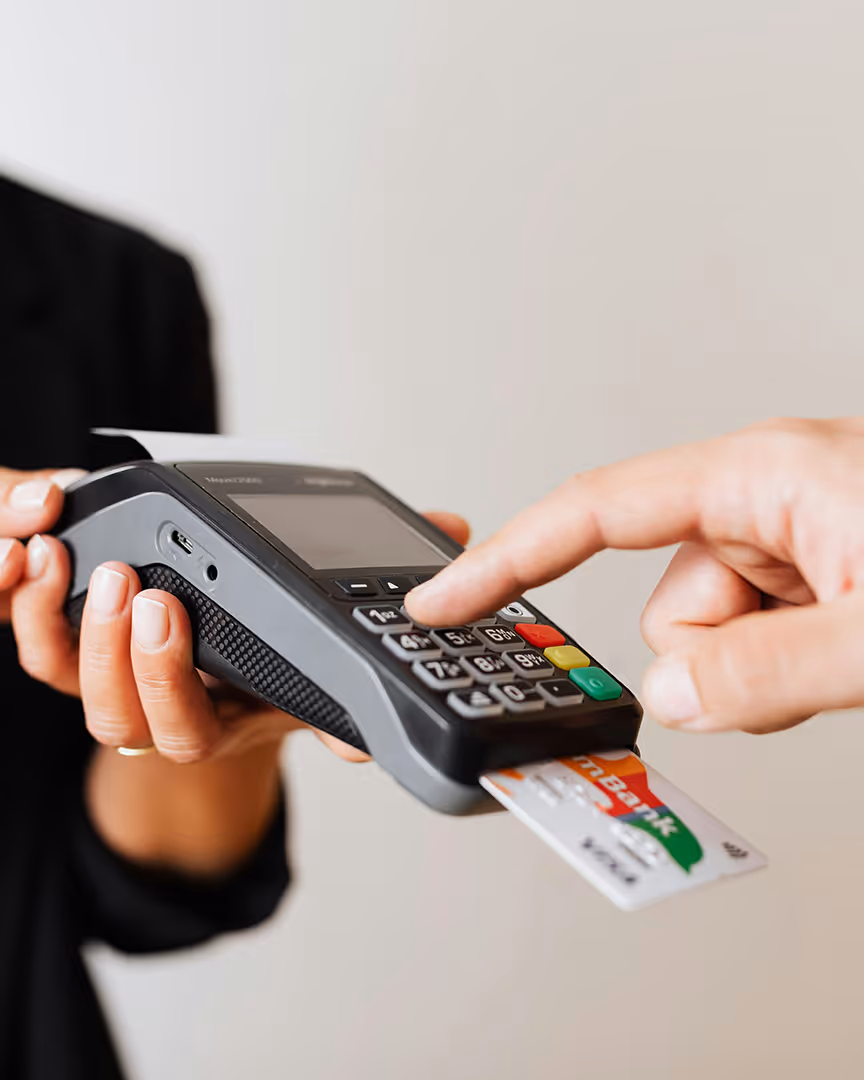 Making a card payment, representing modern airline payment solutions