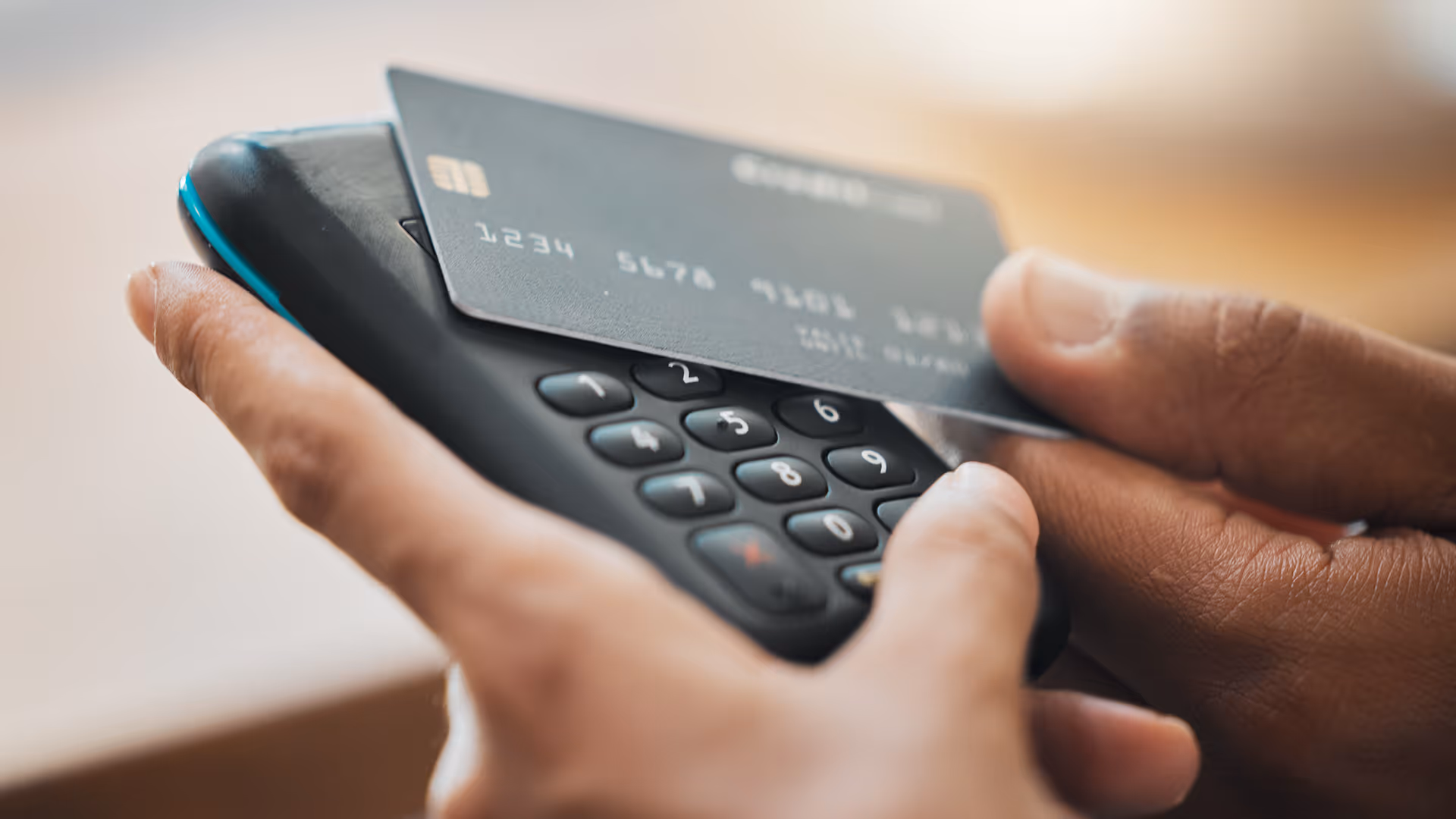 Man making a contactless travel card payment