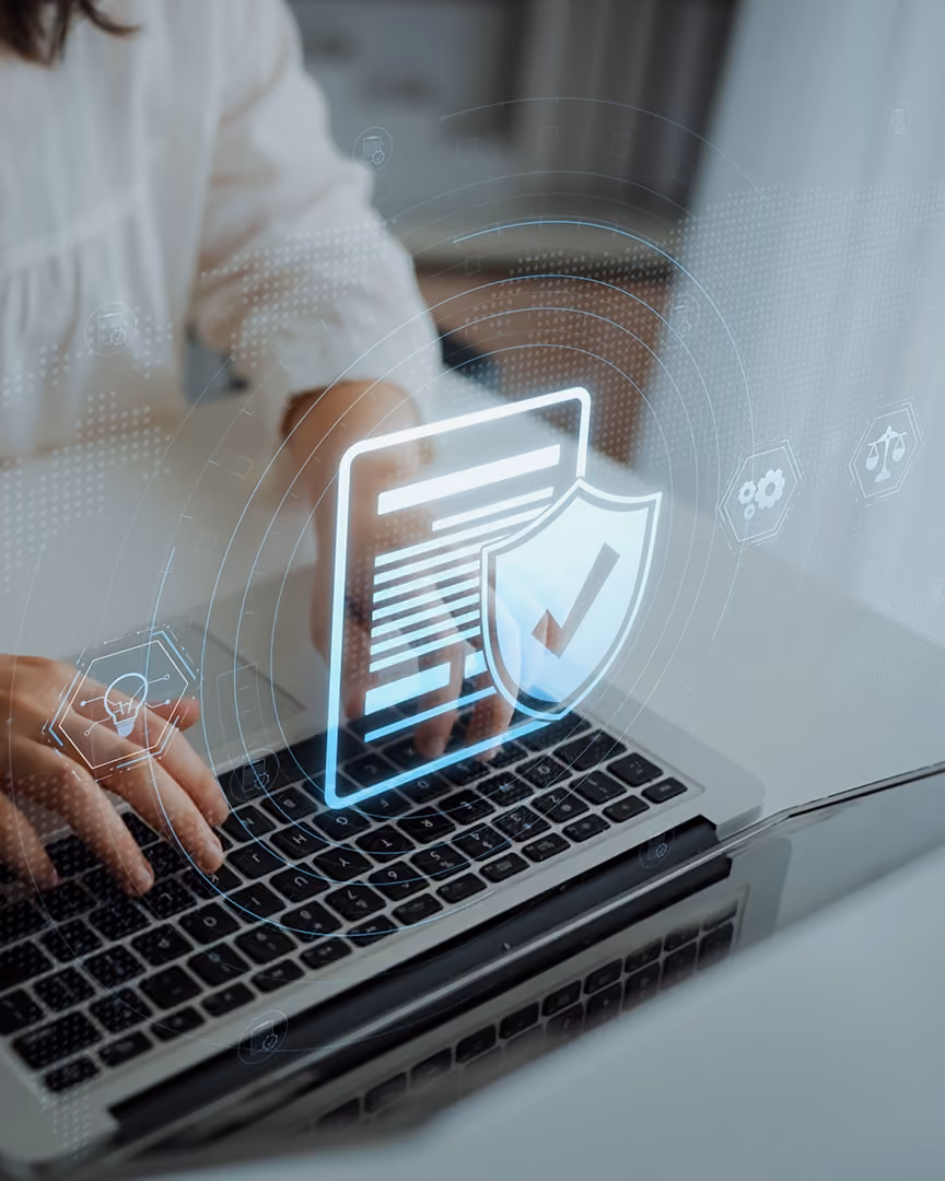 Woman on a laptop sorting legal compliance requirements