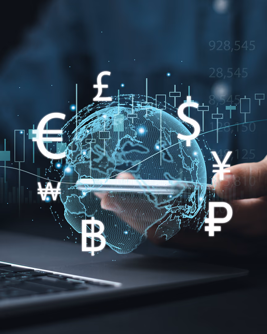 Holographic globe surrounded by currency symbols, representing cross-border payments