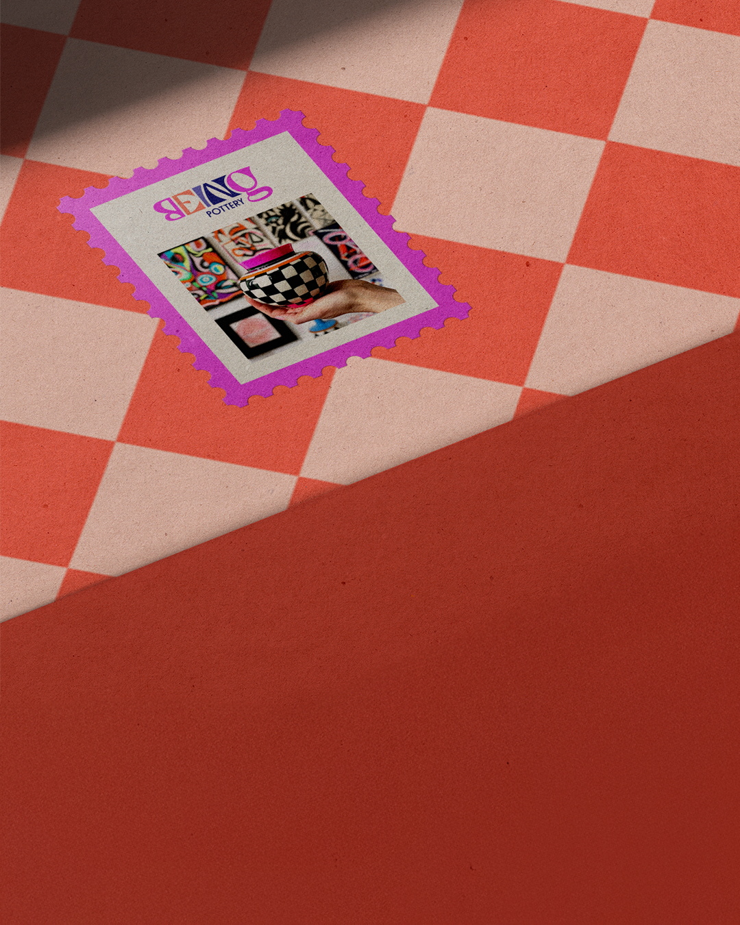 Red checkerboard with a stamp and logo for being pottery