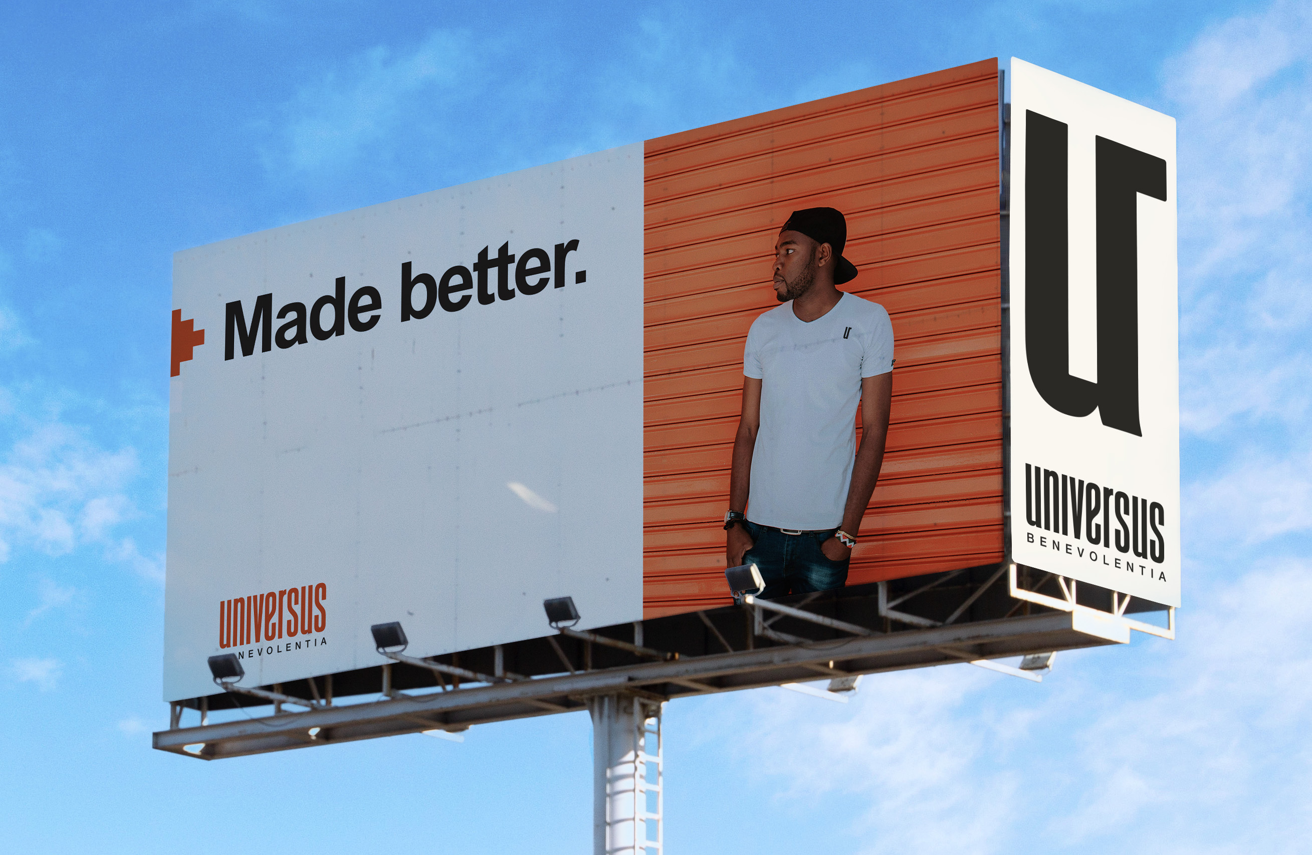 billboard with an african guy wearing a white tshirt from Universus