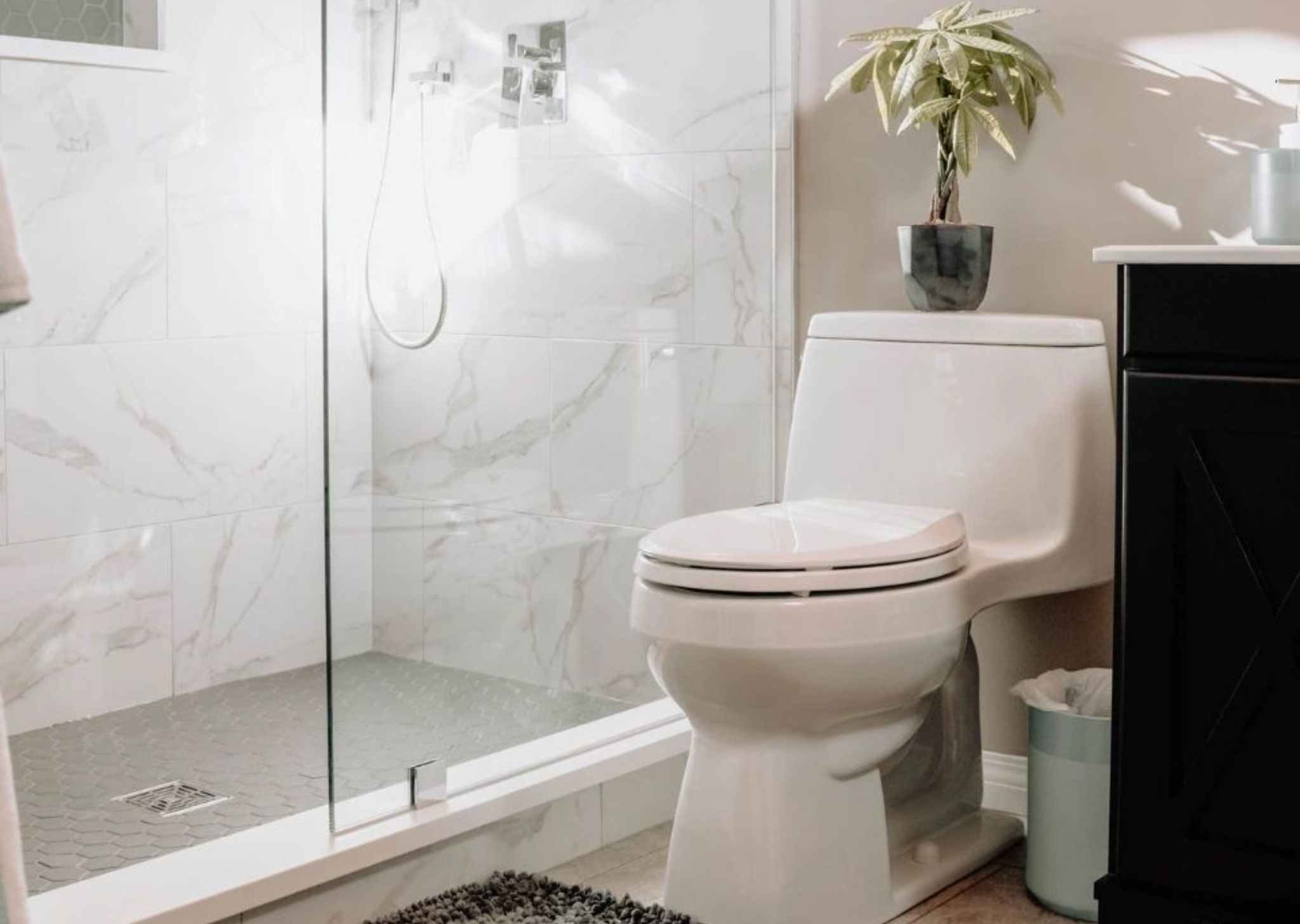 Modern bathroom toilet repaired to ensure proper flushing and leak prevention.