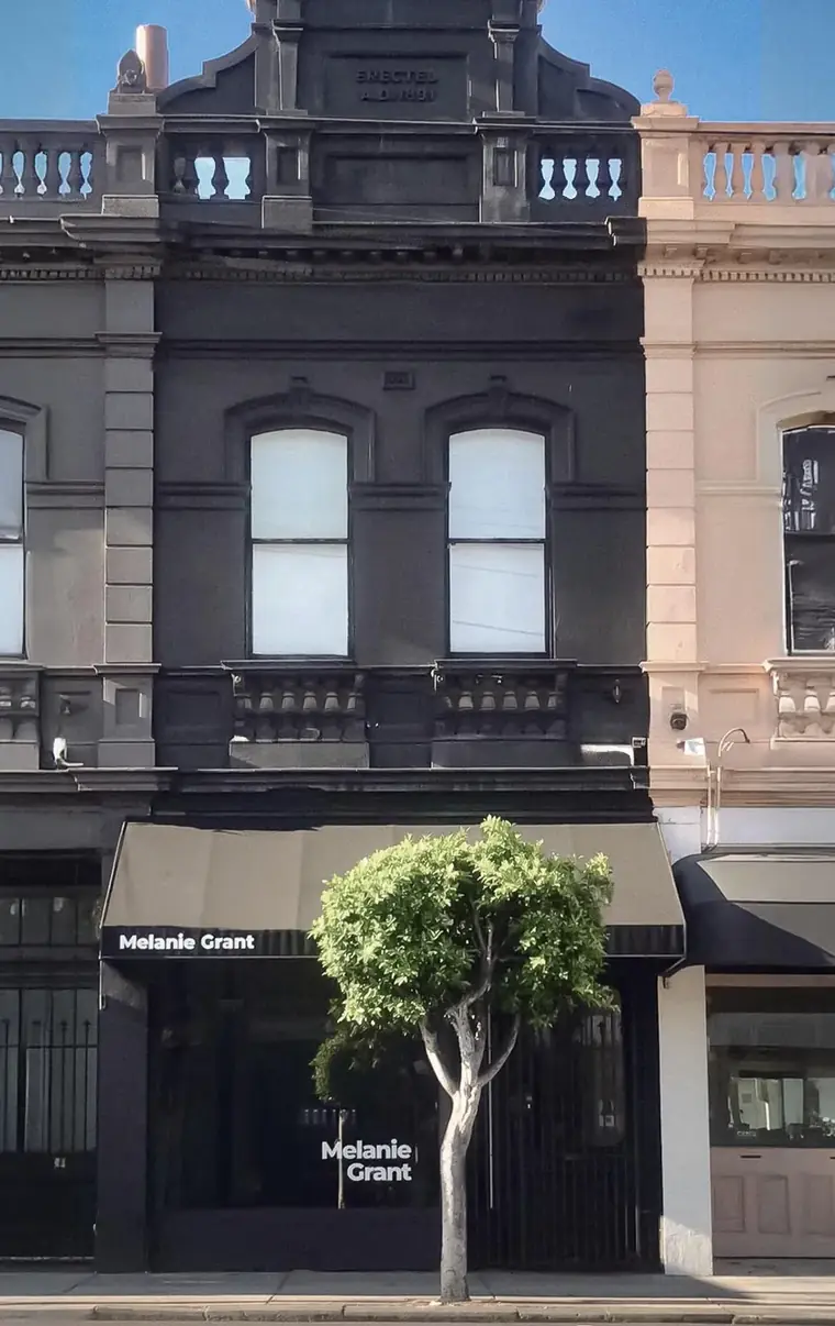 The Melbourne studio's black townhouse facade on High Street, Armadale.