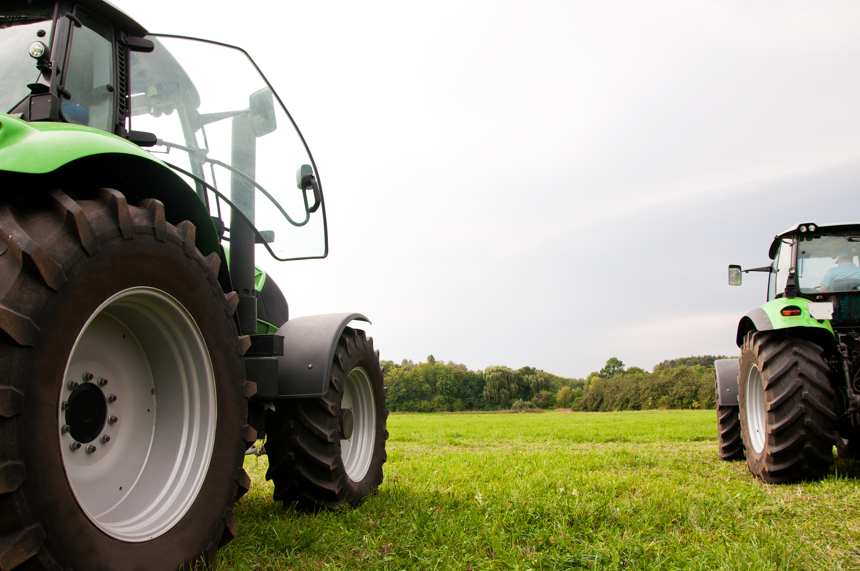 image of tractors harvesting