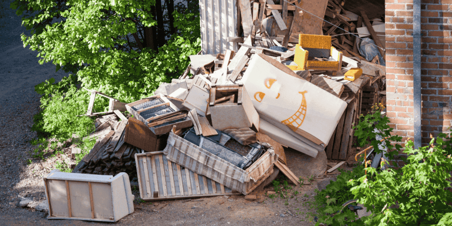 Affordable junk removal team loading furniture into truck in Chicago