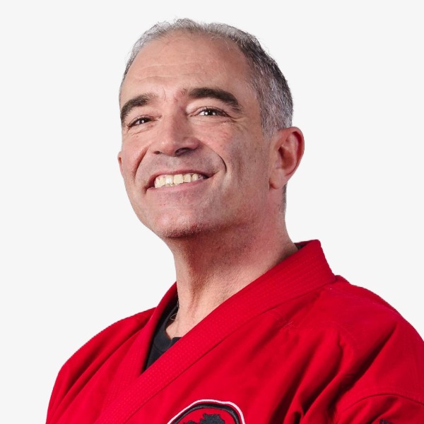 A smiling headshot of USSD Livermore Chief Instructor Sensei Mike