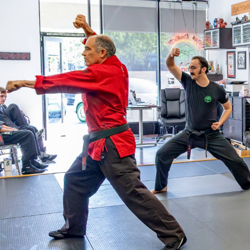 Chief Instructor Sensei Mike leading a karate class in defensive drills