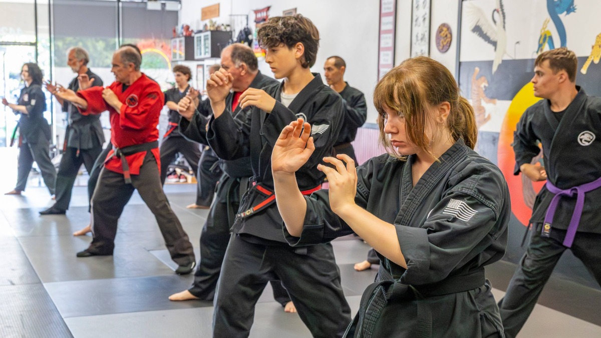 A USSD Livermore Adults Karate Class practicing and training together.