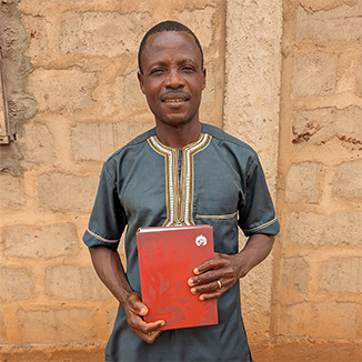 Person holding bible