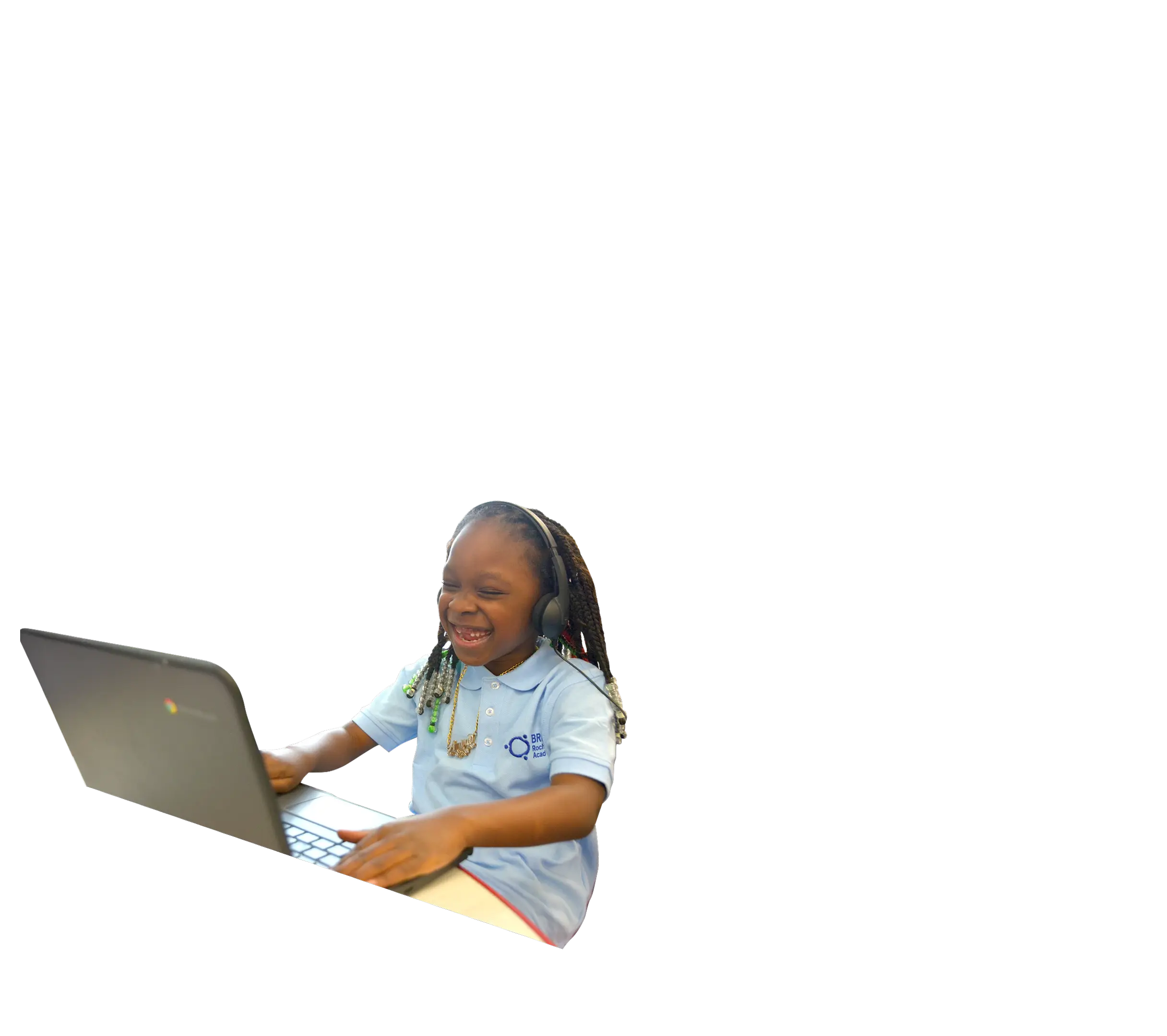 Young girl smiling and wearing Brick school uniform 