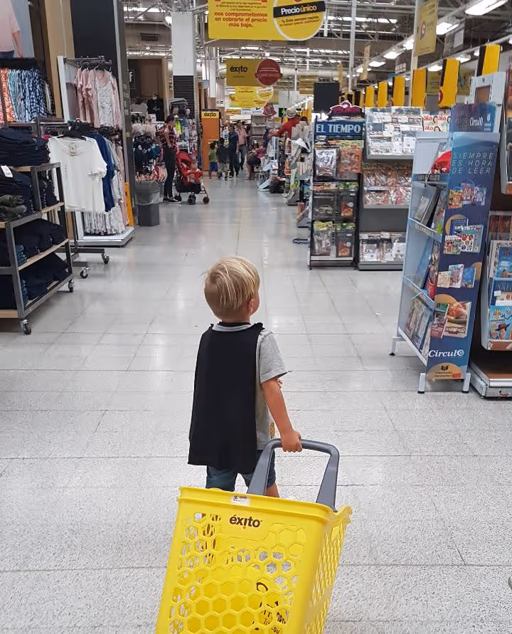 A little Colombiano doing his grocery shopping in Exito, a popular Colombian supermarket chain