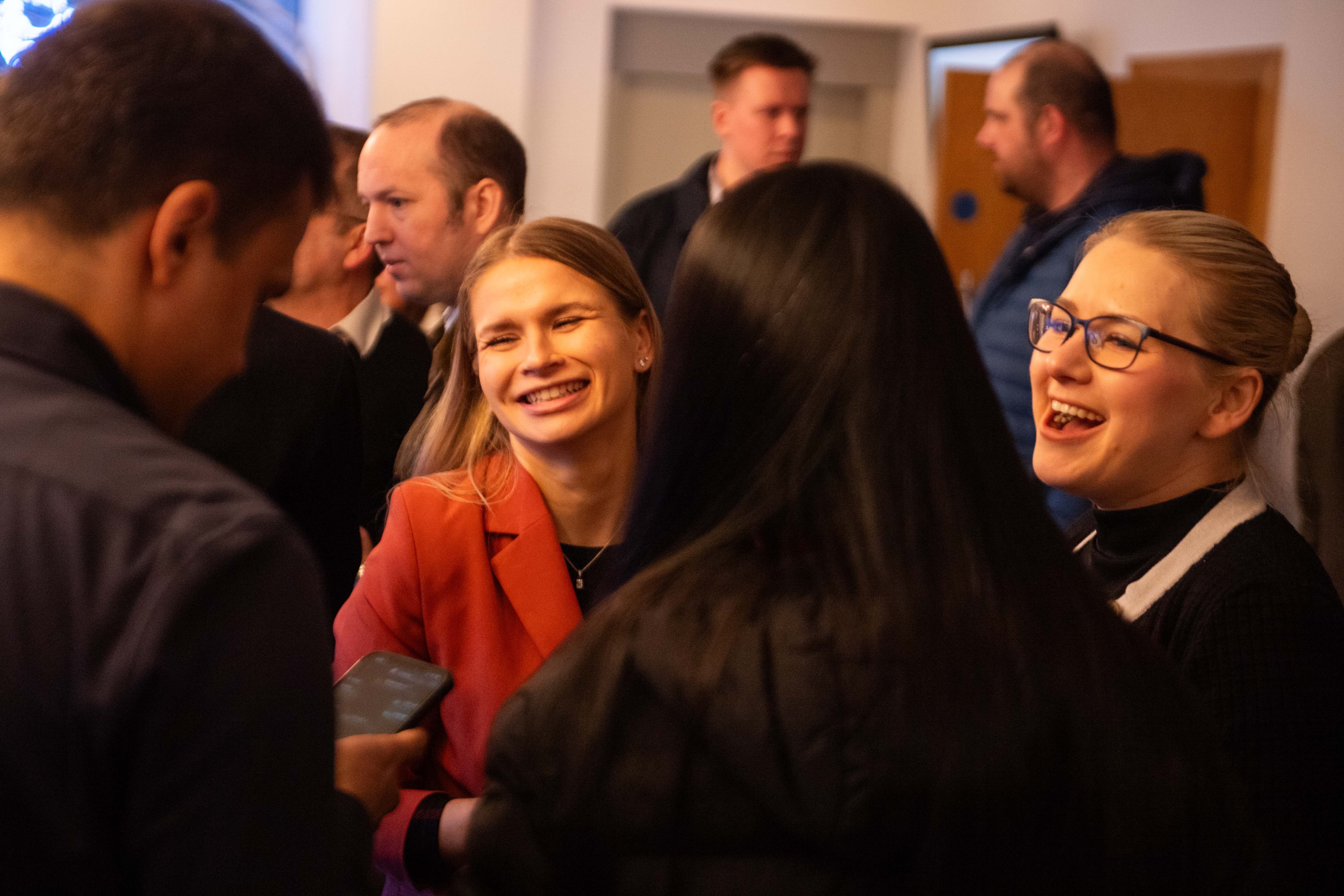 ladies laughing at an event