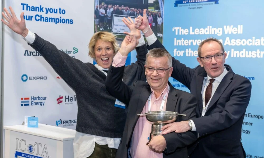 Members of the TechnipFMC winning team with the trophy