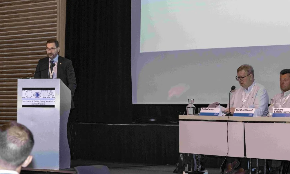 Max speaking at an event