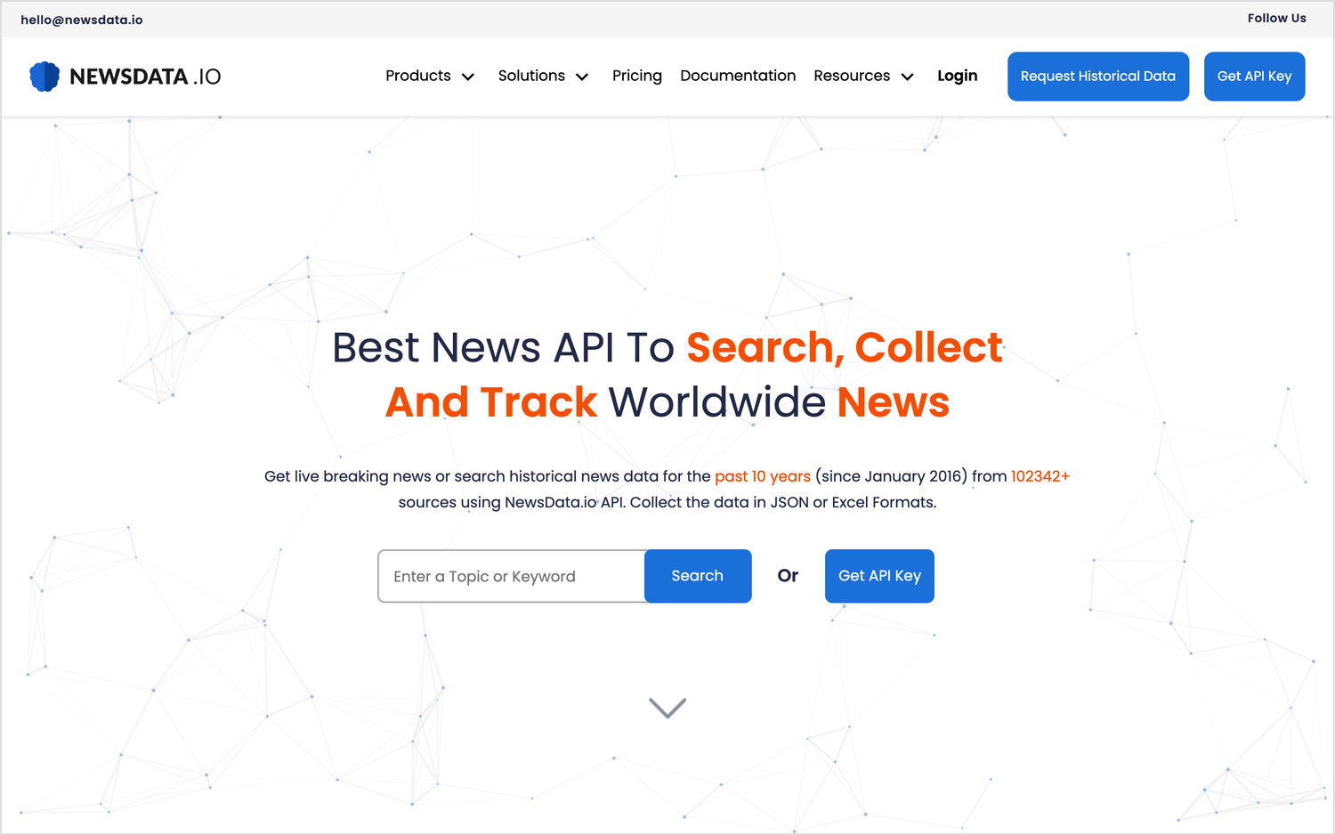 NewsData.io's homepage, headlined "Best News API To Search, Collect And Track Worldwide News", with a keyword search box