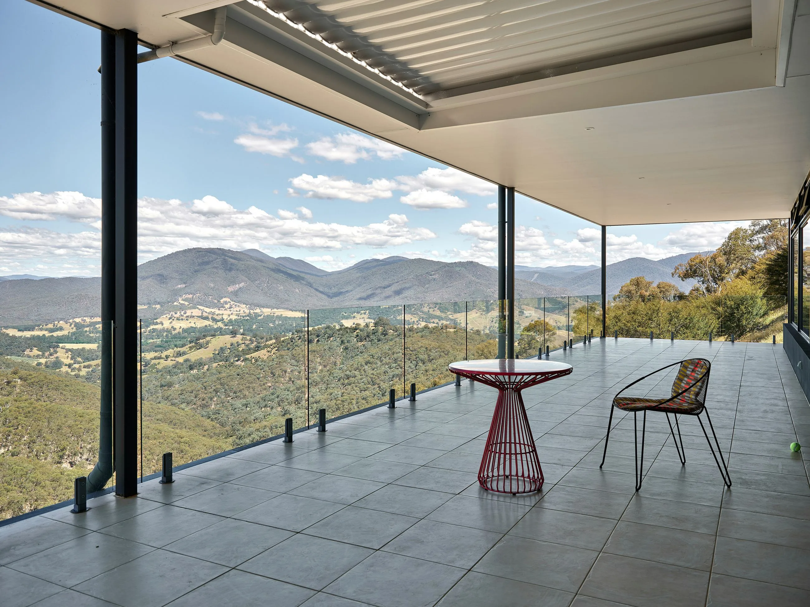 Mountain view from a tiled balcony