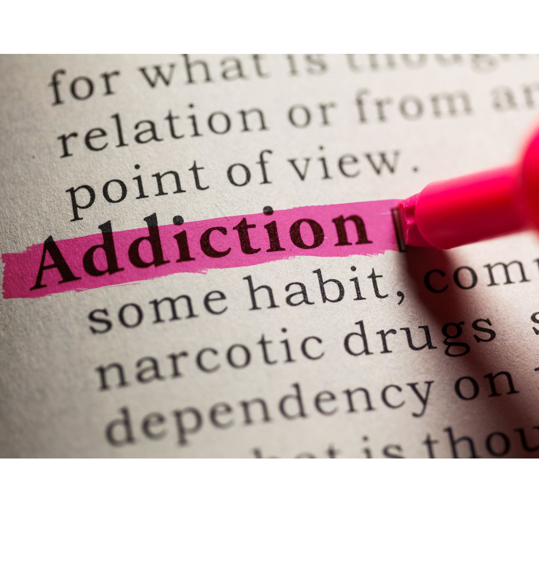 A page of text with the word addiction highlighted in pink marker