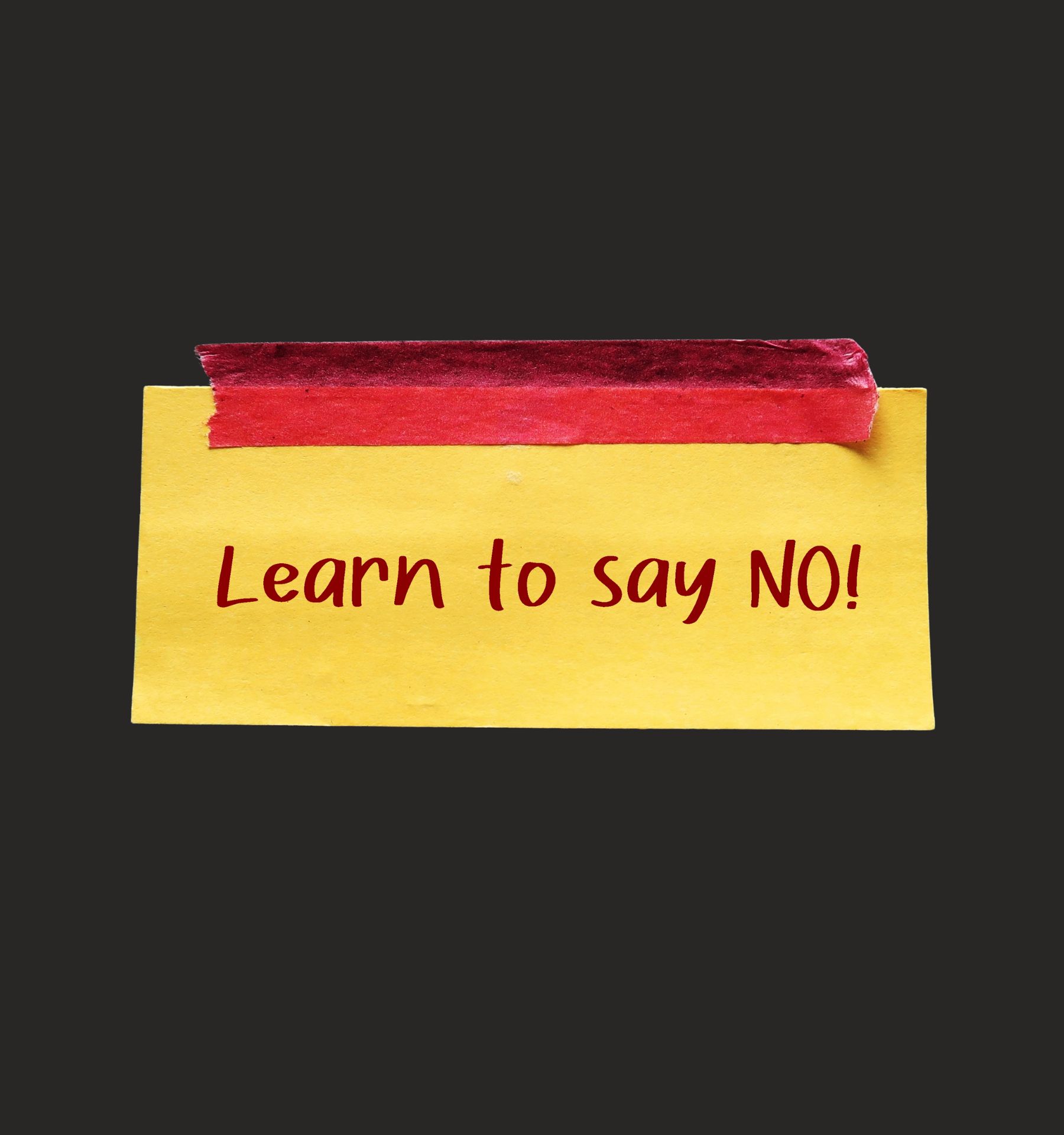 There is a yellow sign stuck on a black frame with red tape, it says "Learn to say no"