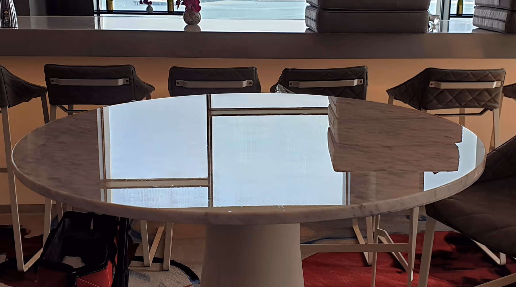 Restored marble table with TuffSkin protection showing a flawless, glossy surface free from stains and etching.