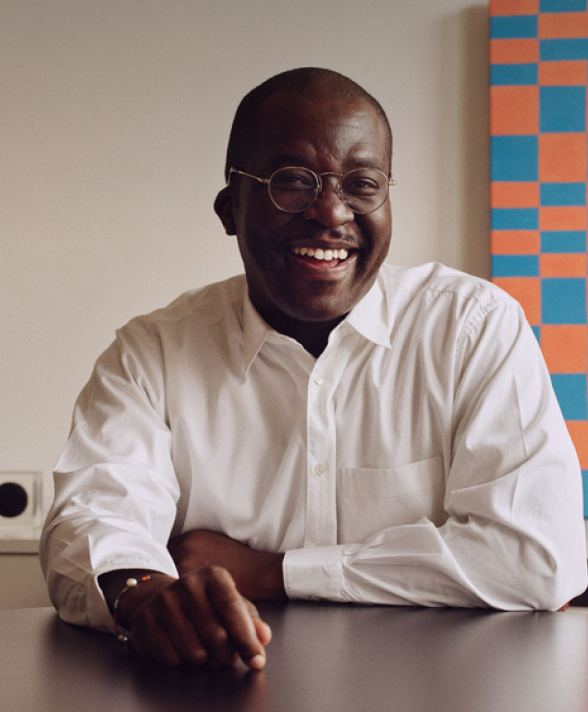 Photo of a man smiling.