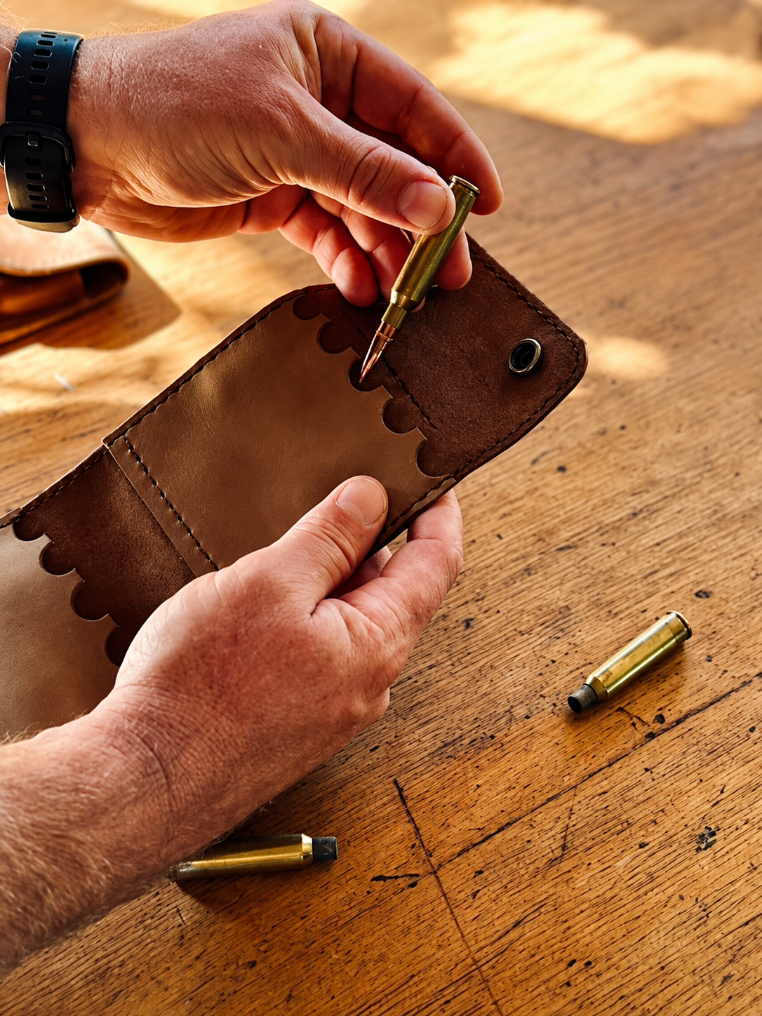 Hand-stitched leather bullet pouch