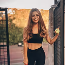 Sarah, fitness and nutrition influencer, showcasing her private label supplement brand
