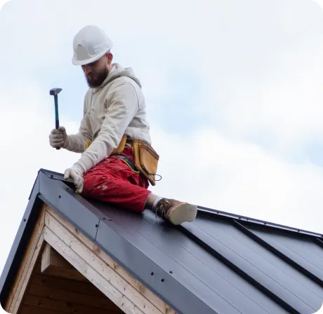 a man working on the roof