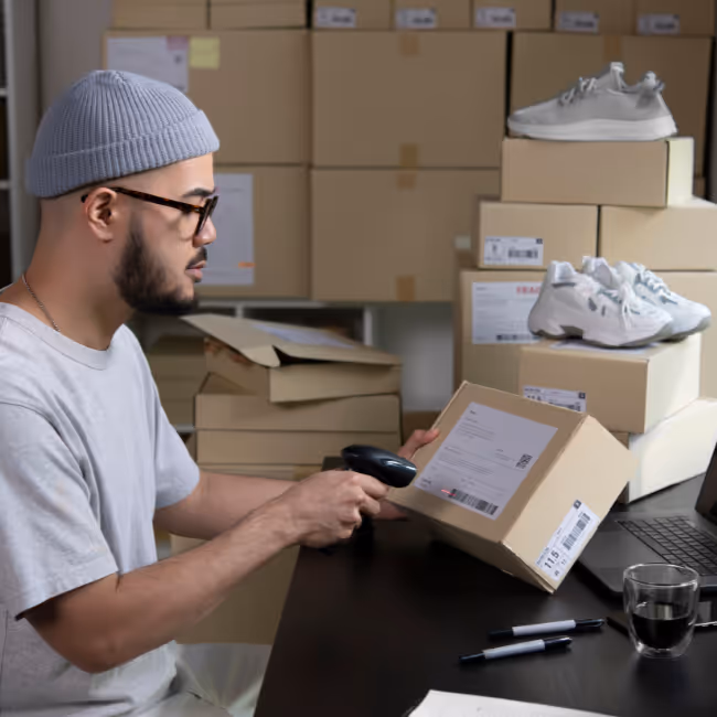 A person scanning an order for fulfillment.