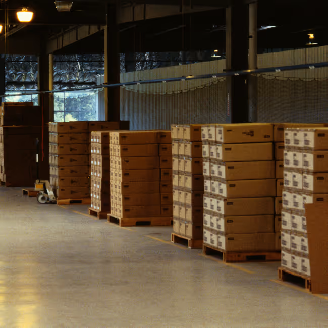New inventory for a brand sitting on pallets ready to be received by a fulfillment center.