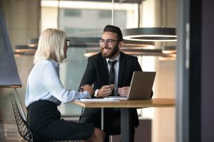 Business partners negotiating at a desk